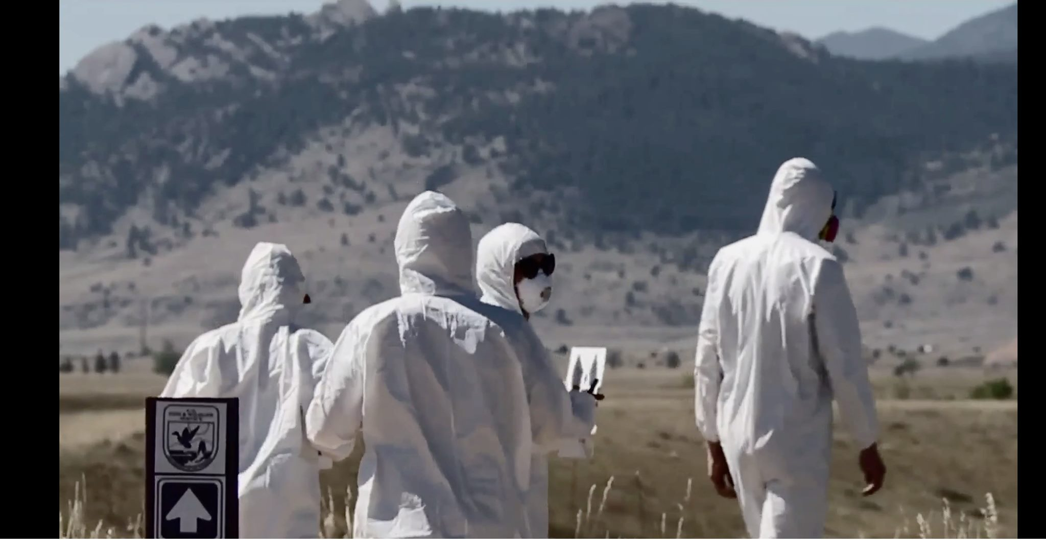 4 people in hazmat suites. Full protection at Rocky Flats!